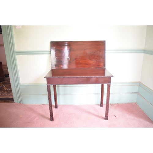 228 - A George III mahogany tea table, on blind fret carved chamfered square legs, 90.5 cm wide, removal c... 