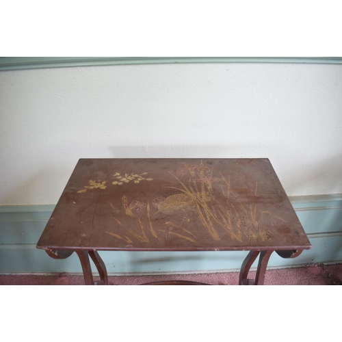 231 - A nest of four Japanese lacquered occasional tables, the largest 53 cm wide, removal cost A