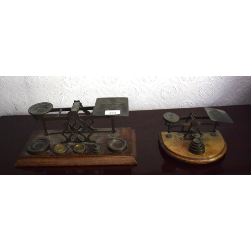 233 - An early 20th century set of postal scales and weights and another set, removal cost A