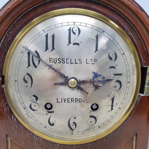 235 - An Edwardian mantle clock, the 15 cm diameter silvered dial signed Russell Ltd Liverpool, with Arabi... 