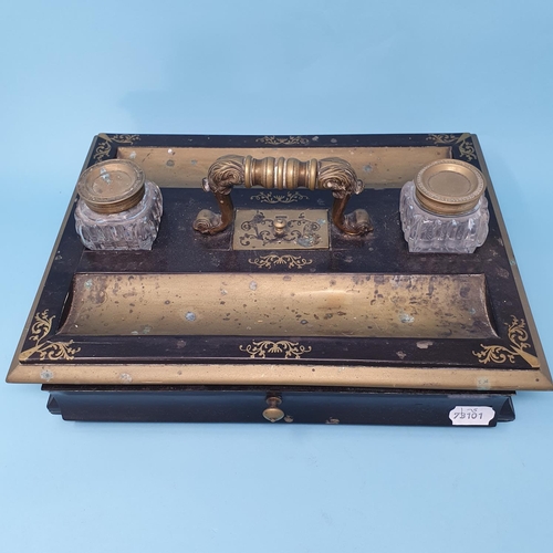 238 - An early 19th century brass mounted inkstand, with a carrying handle and a drawer, 36.5 cm wide, rem... 