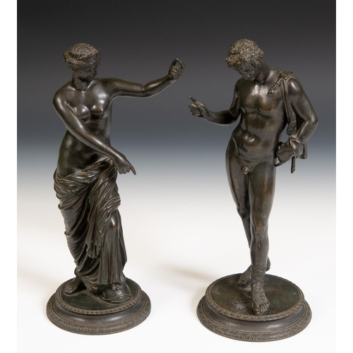 245 - A pair of Grand Tour bronze figures, of a classical scantily clad lady and her companion, 37 cm high... 