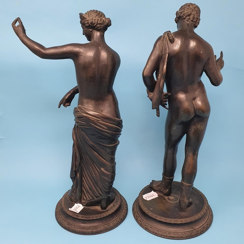 245 - A pair of Grand Tour bronze figures, of a classical scantily clad lady and her companion, 37 cm high... 