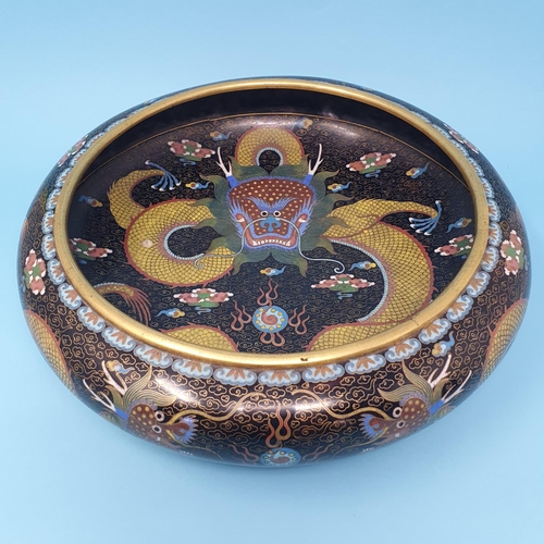 251 - A Chinese cloisonne bowl, decorated a dragon chasing a flaming pearl, 30 cm diameter, removal cost A