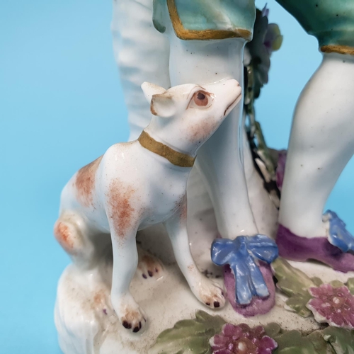 255 - A 19th century porcelain figure, of a hunter with a rifle, 18 cm high, and another Dresden figure of... 