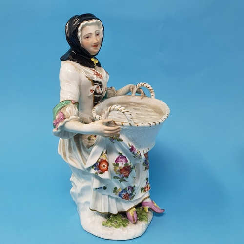 256 - A pair of 19th century Dresden figures, man and a woman holding baskets, 29 cm high, removal cost A