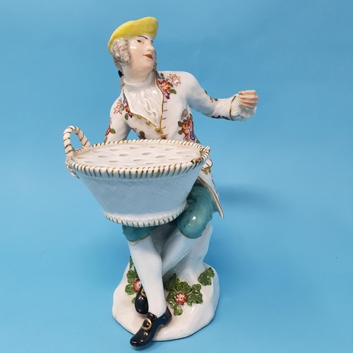 256 - A pair of 19th century Dresden figures, man and a woman holding baskets, 29 cm high, removal cost A