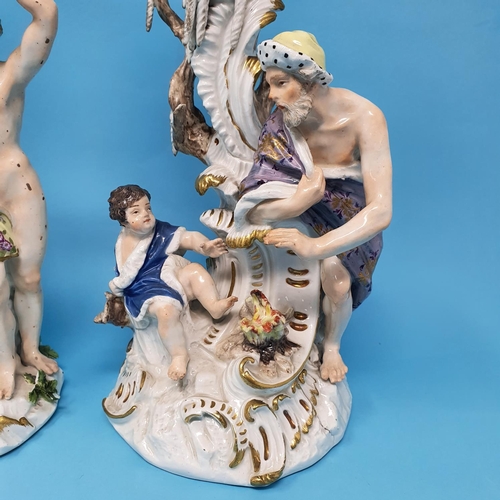 258 - A pair of Dresden candlesticks, autumn and winter, figural bases, 30 cm high, removal cost A