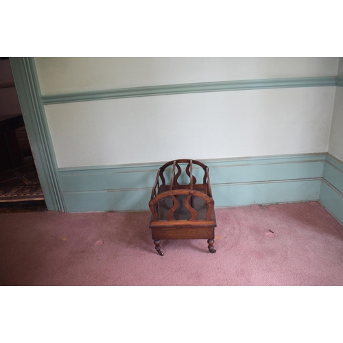 262 - A late 19th century rosewood Canterbury, with a drawer on turned legs, 54 cm wide, removal cost A