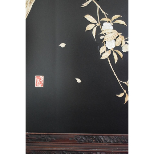 273 - A pair of late 19th/early 20th century Japanese lacquered mother of pearl and bone inlaid panels, de... 