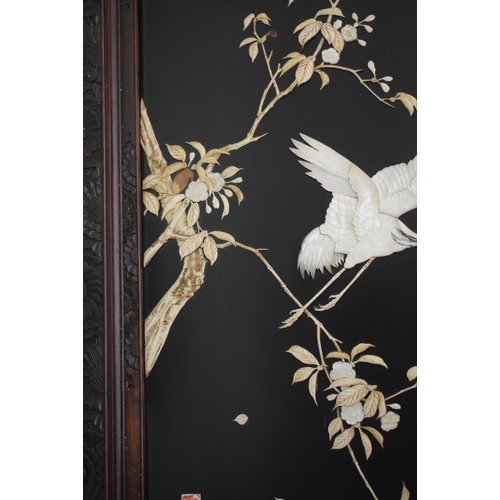 273 - A pair of late 19th/early 20th century Japanese lacquered mother of pearl and bone inlaid panels, de... 