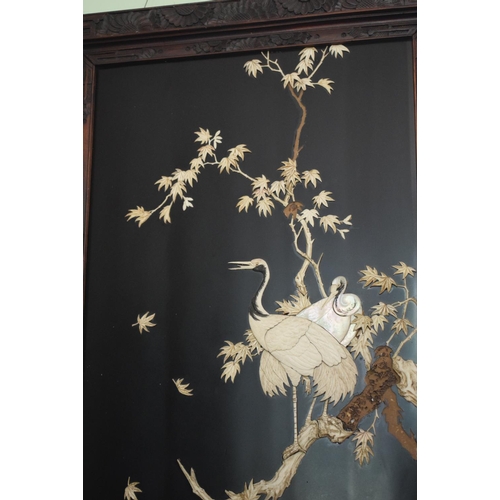 273 - A pair of late 19th/early 20th century Japanese lacquered mother of pearl and bone inlaid panels, de... 