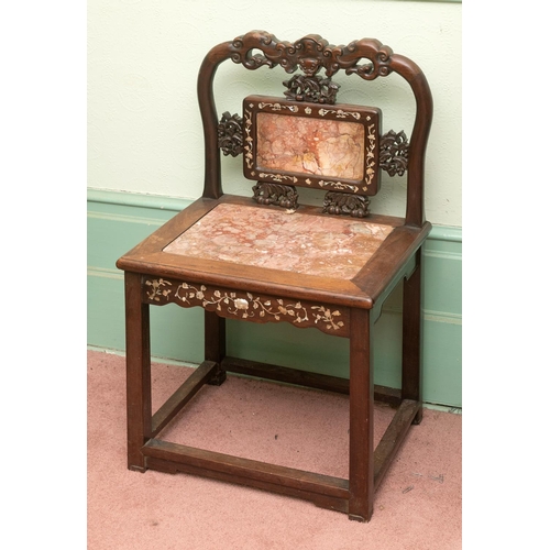 275 - A Chinese hardwood chair, inlaid with mother of pearl, with carved and pierced decoration, the back ... 