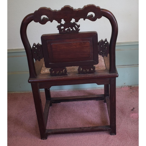 275 - A Chinese hardwood chair, inlaid with mother of pearl, with carved and pierced decoration, the back ... 