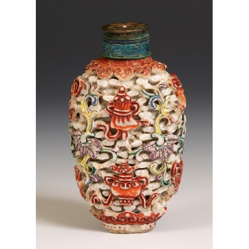 286 - A Chinese carved hardstone snuff bottle, decorated fish, vases and sprigs, character mark to base, 7... 