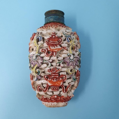 286 - A Chinese carved hardstone snuff bottle, decorated fish, vases and sprigs, character mark to base, 7... 