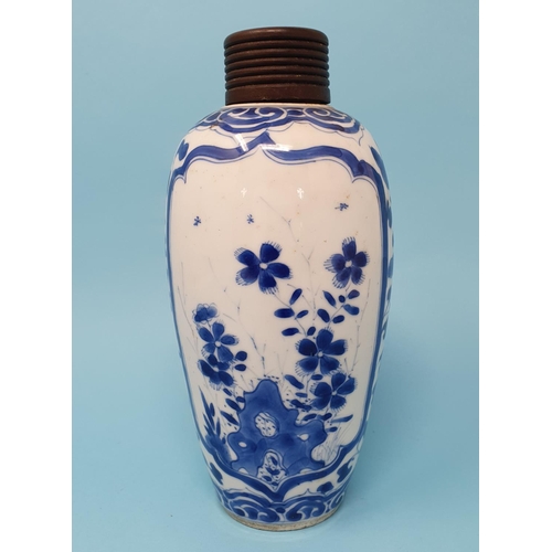 288 - A Chinese blue and white vase, decorated flowers, 20 cm high, removal cost A