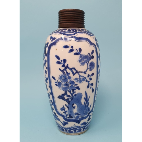 288 - A Chinese blue and white vase, decorated flowers, 20 cm high, removal cost A