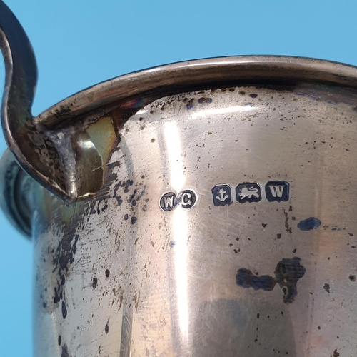 289 - A George V silver two handled trophy cup, Birmingham 1921, on an ebonised base, and an Edward VII pr... 