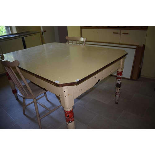 29 - A late Victorian painted pine kitchen table, corners cut, later formica top, 152 cm wide, a painted ... 