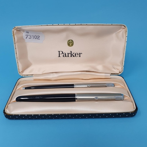 294 - A Parker pen set, cased