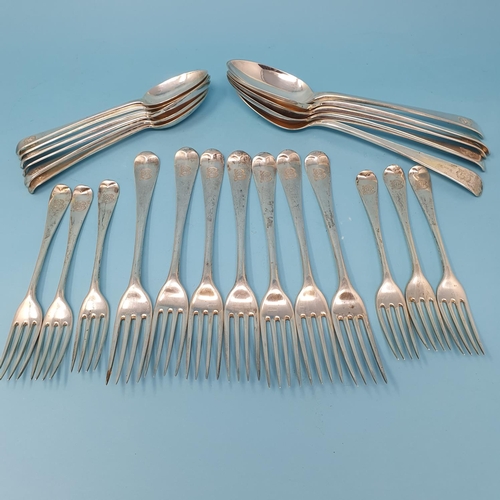 298 - A Victorian old English pattern part service of silver cutlery, comprising five table spoons, six ta... 