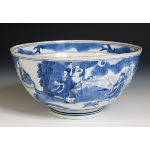 301 - A Chinese bowl, decorated figures in underglaze blue, six character mark to base, 21 cm diameter, re... 