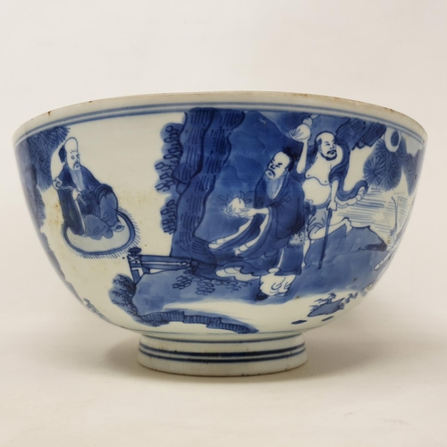 301 - A Chinese bowl, decorated figures in underglaze blue, six character mark to base, 21 cm diameter, re... 