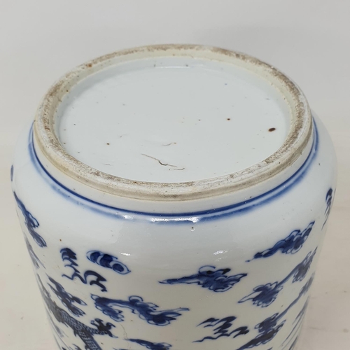 302 - A Chinese blue and white jardiniere, decorated dragons chasing a flaming pearl, 14 cm high, removal ... 