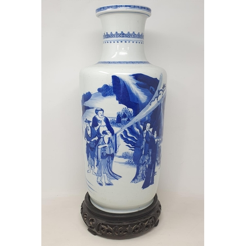 309 - A Chinese rouleau vase, decorated a man breathing fire with a dragon and other figures in underglaze... 