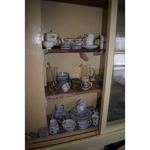 31 - Assorted ceramics and glass, including tea and dinner wares, in the Butler's pantry, removal cost C