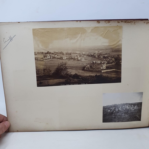 328 - A photograph and scrap album, Paris 1902, Tresco, July 1905 and others