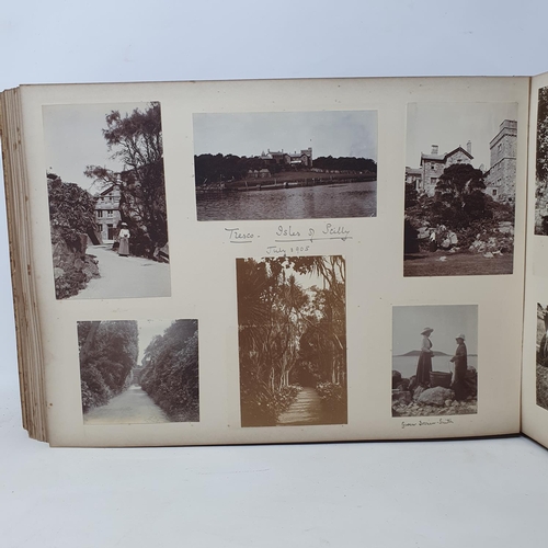 328 - A photograph and scrap album, Paris 1902, Tresco, July 1905 and others