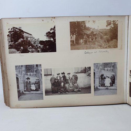 328 - A photograph and scrap album, Paris 1902, Tresco, July 1905 and others