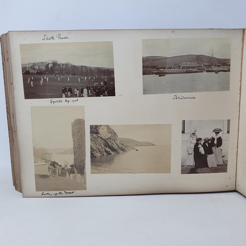 328 - A photograph and scrap album, Paris 1902, Tresco, July 1905 and others