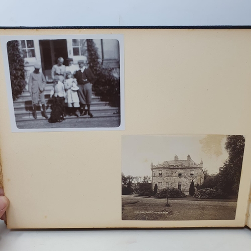 332 - A photograph and scrap album, Aldourie House, Cluny Castle, 1900 and others