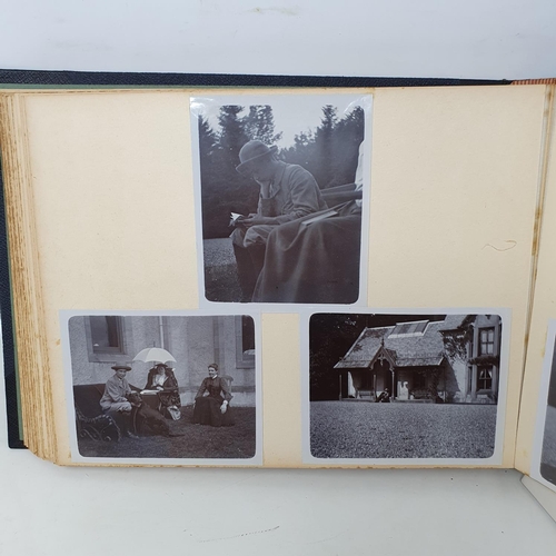 332 - A photograph and scrap album, Aldourie House, Cluny Castle, 1900 and others