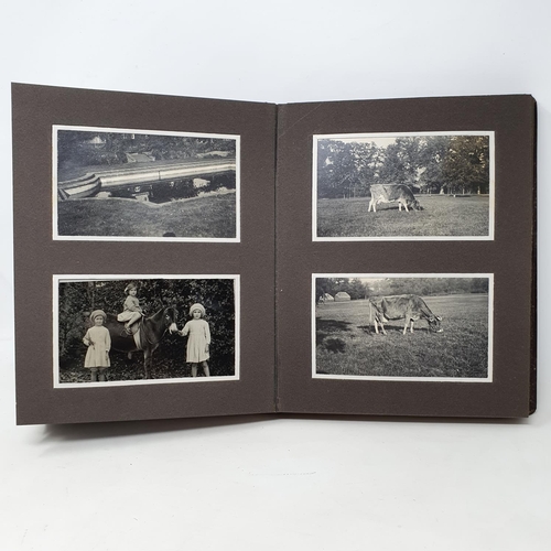 335 - A photograph and scrap album, country estate Life, 1916 to 1921