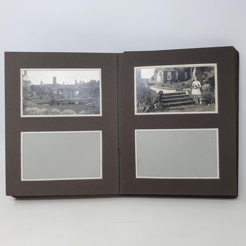 335 - A photograph and scrap album, country estate Life, 1916 to 1921