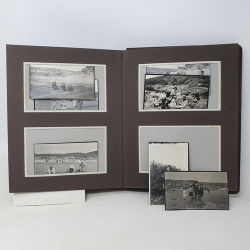 335 - A photograph and scrap album, country estate Life, 1916 to 1921