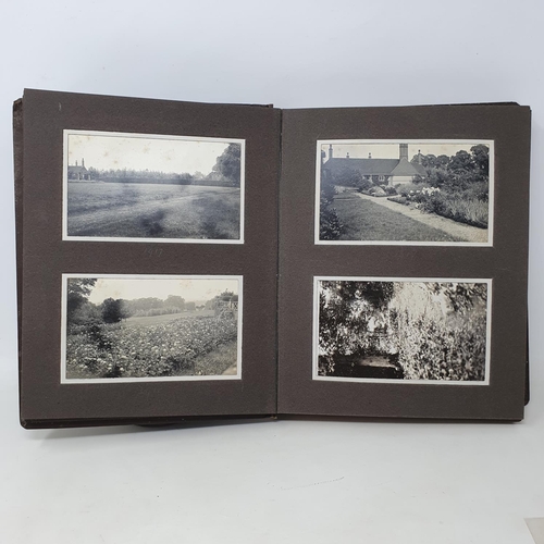 335 - A photograph and scrap album, country estate Life, 1916 to 1921