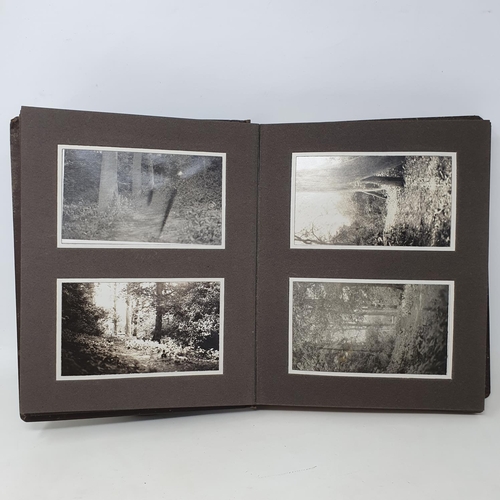 335 - A photograph and scrap album, country estate Life, 1916 to 1921