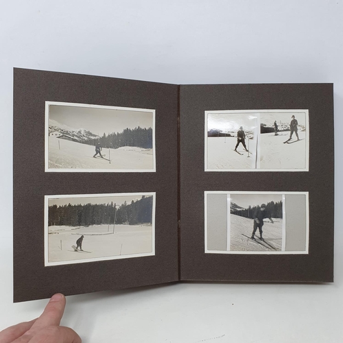 338 - A photograph and scrap album, Lenk and other winter pastimes