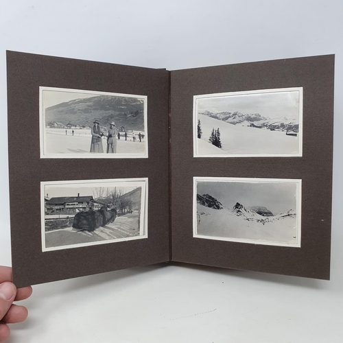 338 - A photograph and scrap album, Lenk and other winter pastimes