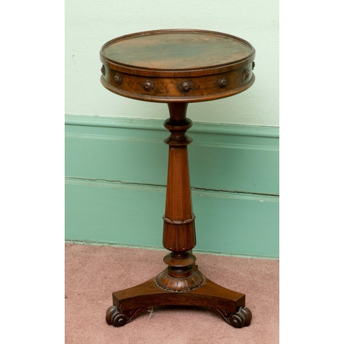 346 - An unusual William IV rosewood work table, the drum top with the lid lifting up to reveal a fitted i... 