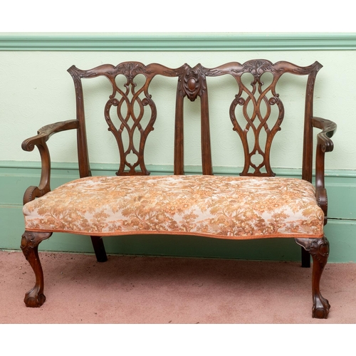 350 - A late 18th century style mahogany double chair back settee, with pierced vase shaped splats, an uph... 