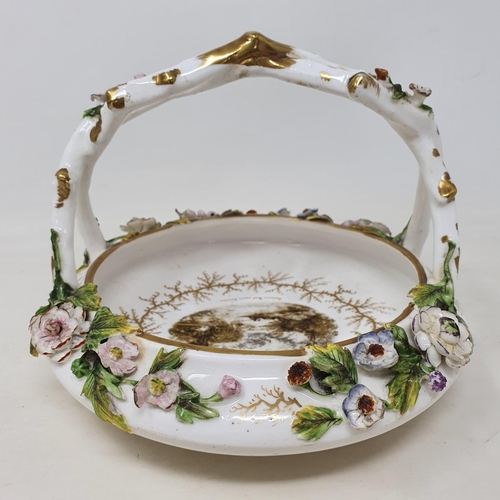 355 - A 19th century Rockingham porcelain basket, Salmon Pool near Exeter, 15 cm high, removal cost A