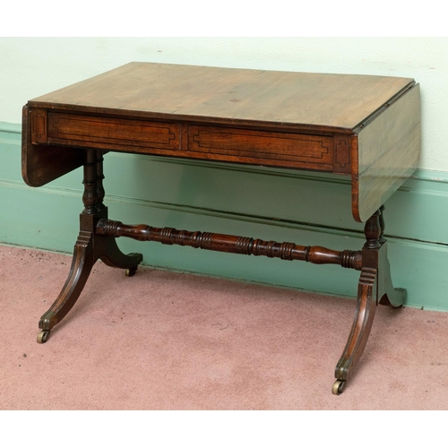 357 - A Regency inlaid mahogany sofa table, having two frieze drawers, on ring turned and baluster end sup... 