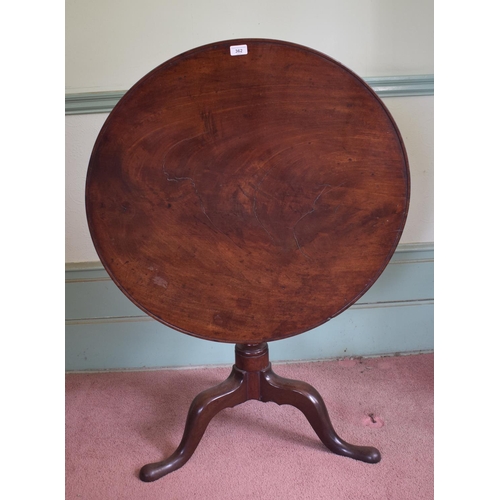 362 - A George III mahogany tripod table, the dished top on a baluster turned column, 81.5 cm diameter, re... 