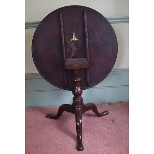 362 - A George III mahogany tripod table, the dished top on a baluster turned column, 81.5 cm diameter, re... 